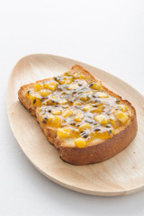 breakfast with toast fruit jam and butter on table