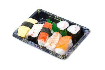 Sushi set in stylish tray isolated on white background.