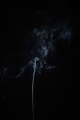 Abstract smoke moves on a black background. Design element. Abstract texture.