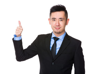 Fototapeta na wymiar Asian Businessman showing thumb up