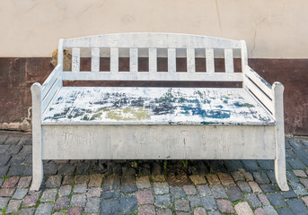 Bench in old European city