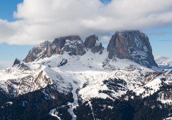 Obraz premium Skiing area in the Dolomites Alps. Overlooking the Sella group in Val Gardena. Italy