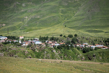 Fototapeta na wymiar small village seen from Georgian Military Highway in northern part of Georgia