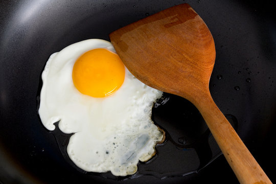 Cooking Fried Egg on a frying pan