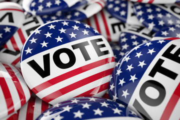 Closeup shot of one vote button in focus in between many other buttons in a box. Selective focus with shallow depth of field.