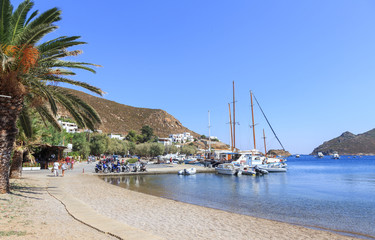 Fototapeta na wymiar The Greek island of Patmos in the Aegean Sea - the beach Grikos. Grikos bay is situated in the southeast 4.5 km from the port in Skala