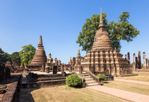 Buddha statue and pagoda in Wat Maha That, Shukhothai Historical