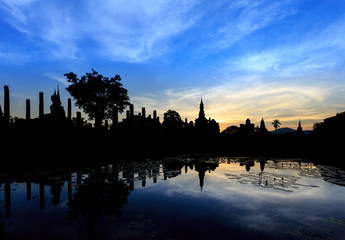 Fototapeta na wymiar Wat Maha That at sun set, Shukhothai Historical Park, Thailand