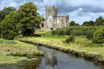 Fototapeta na wymiar Tintern Abbey was a Cistercian abbey located on the Hook peninsula, County Wexford, Ireland