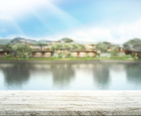 Fototapeta premium Table Top And Blur Building Of Background