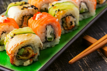 Sushi set: sushi roll with salmon and sushi roll with smoked eel