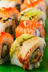 Sushi set: sushi roll with salmon and sushi roll with smoked eel