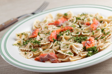 Farfalle pasta with salmon and dill