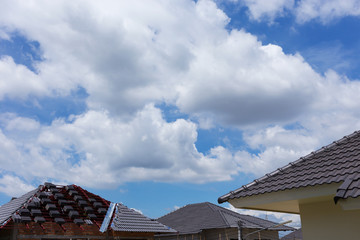 black tile roof on residential building construction house