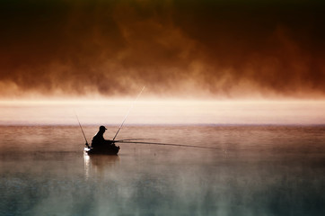 Lone fisherman in boat