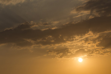 Fototapeta premium sunset sky background, light rays of sunbeam in evening
