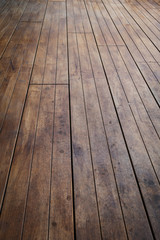 close-up image of aged wooden floor in building