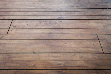 close-up image of aged wooden floor in building