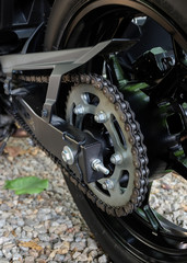 Fototapeta premium rear chain and sprocket of motorcycle wheel