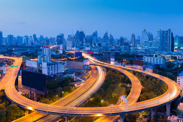 Fototapeta na wymiar Twilight of city downtown highway curved and interchange, Bangkok Thailand