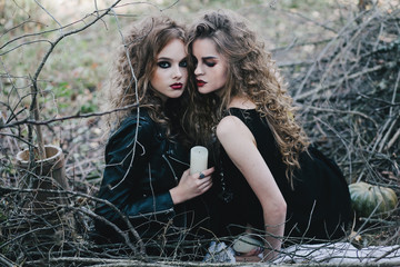 Two vintage witches gathered eve of Halloween