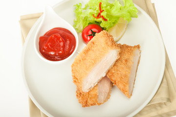 Fried chicken meat in breadcrumbs
