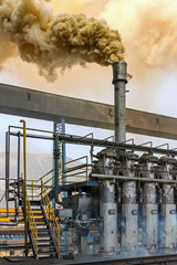 Tarry smoke coming from the burner on the coking plant