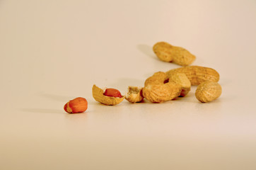 a handful of peanuts in their shells