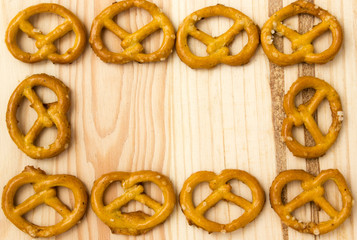 Pretzels on wooden background