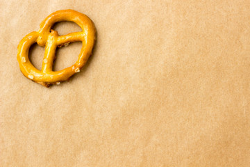 Pretzels on brown paper background