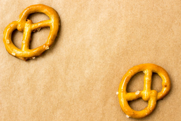 Pretzels on brown paper background