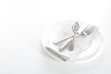 Table setting in white and gray colors