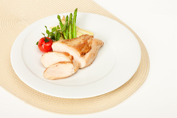 Fried chicken fillet in white cream sauce