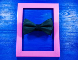 Pink frame background  with bow tie