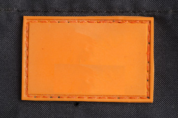The label on a black synthetic material