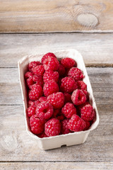 Raspberries in carton box