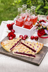 Cherry pie and cherry juice. Garden party