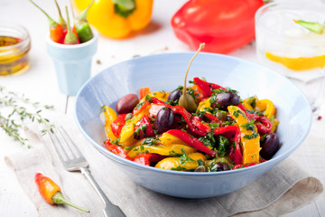 Roasted yellow and red bell pepper salad. Grilled vegetables.
