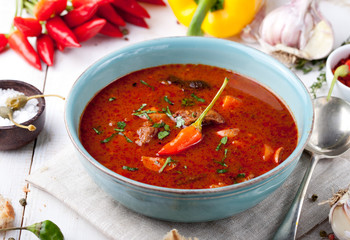 Goulash, beef, tomato, pepper, chili, smoked paprika soup. 