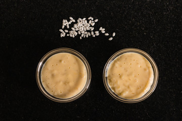 rice pudding with grains of rice on black background