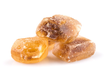 Brown caramelized lump cane sugar cube