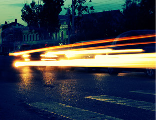 Trails of car lights toned image