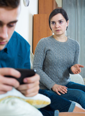 Mother asking for attention of teenager