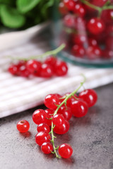 Fresh red currants on table close up