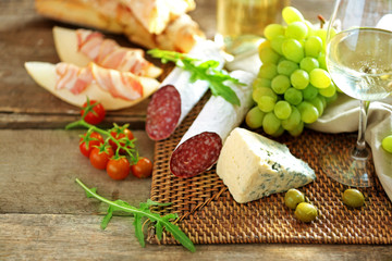 Still life with various types of Italian food and wine