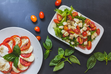 Caprese salad, Italian salad,Tomato mozzarella basil leaves. Top