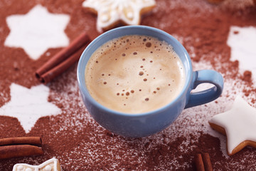 Beautiful composition with cup of cappuccino and Christmas cookies
