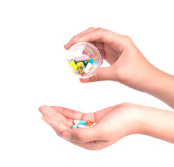 Druge capsules and pills in hand