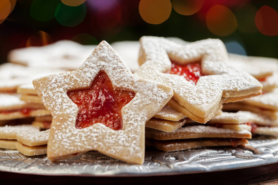 Plate of Christmas cookies under lights