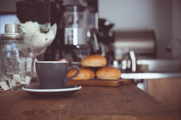 Coffee cup in coffee shop - vintage style effect picture